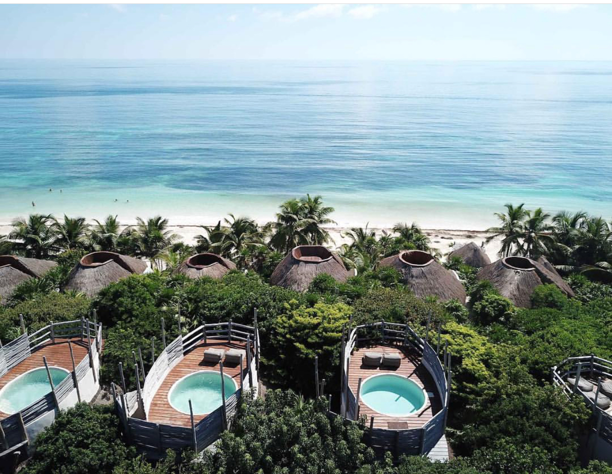 Aerial view of cabanas along the Tulum coastline