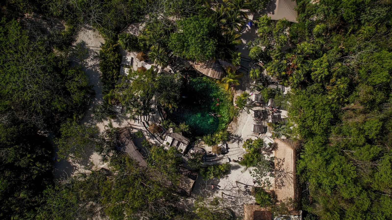 Aerial view of the cenote hidden in the Tulum jungle