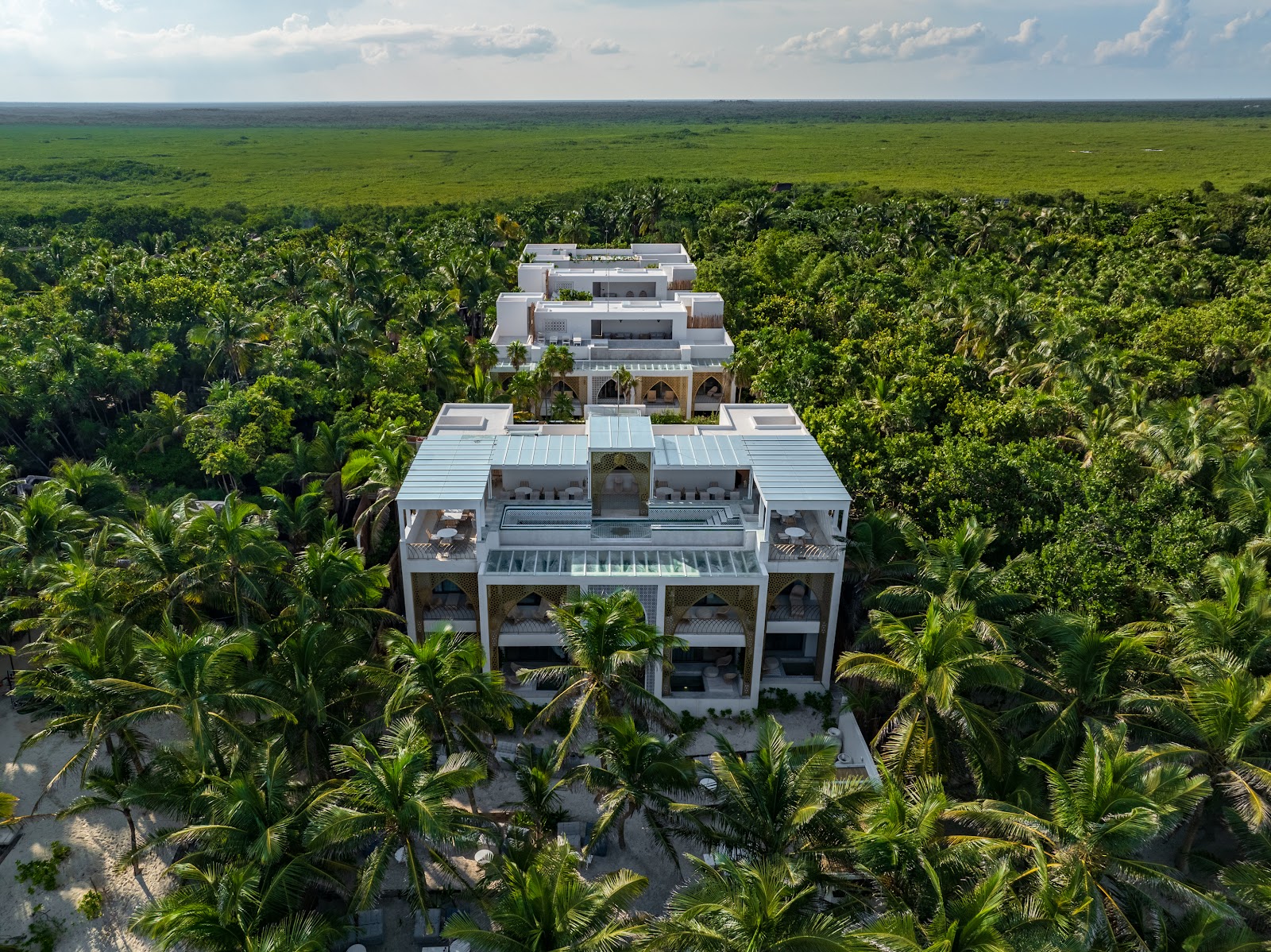 Aerial view of the hotel surrounded by the Tulum jungle