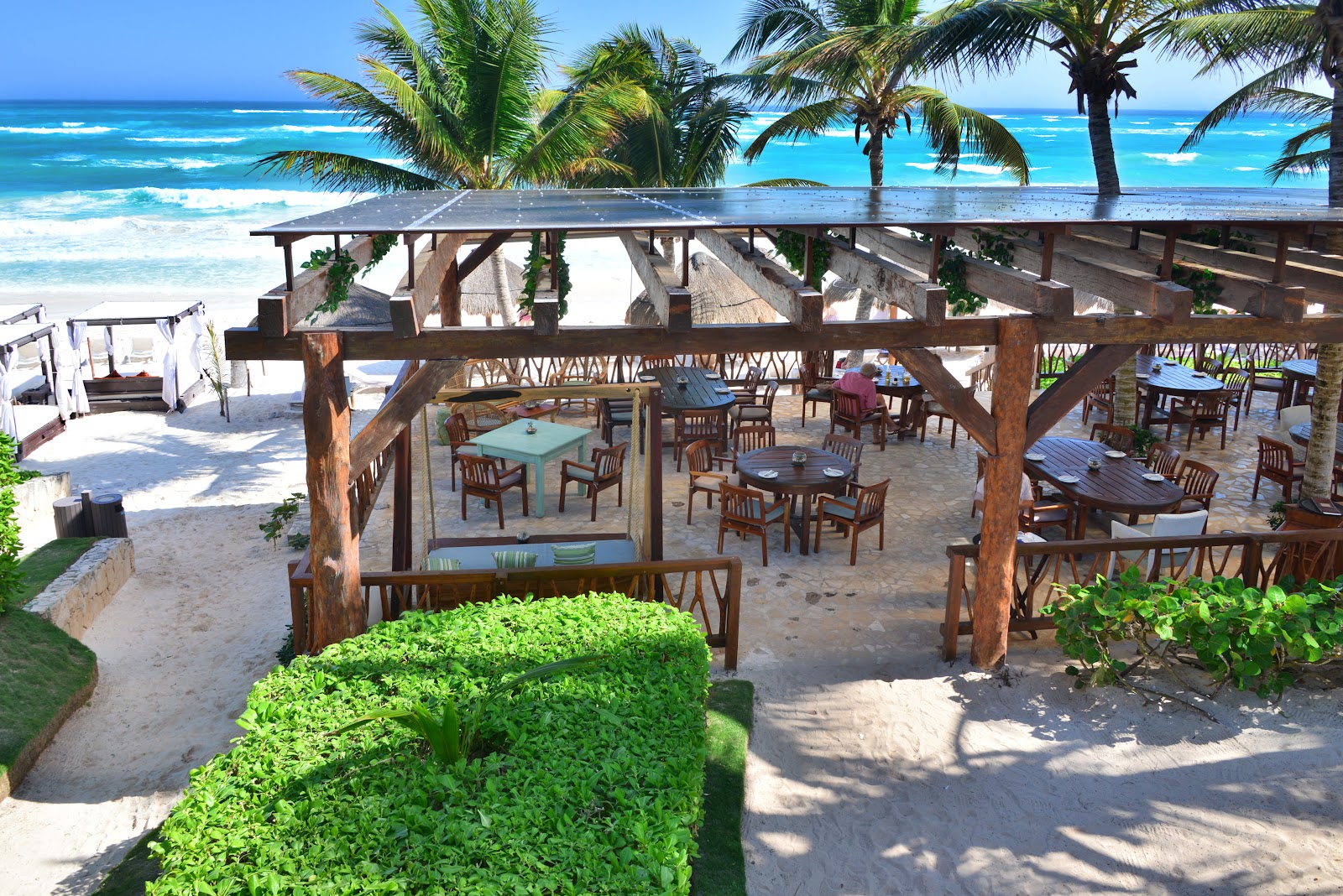 Ana y José Beach Club dining pergola overlooking the Caribbean Sea