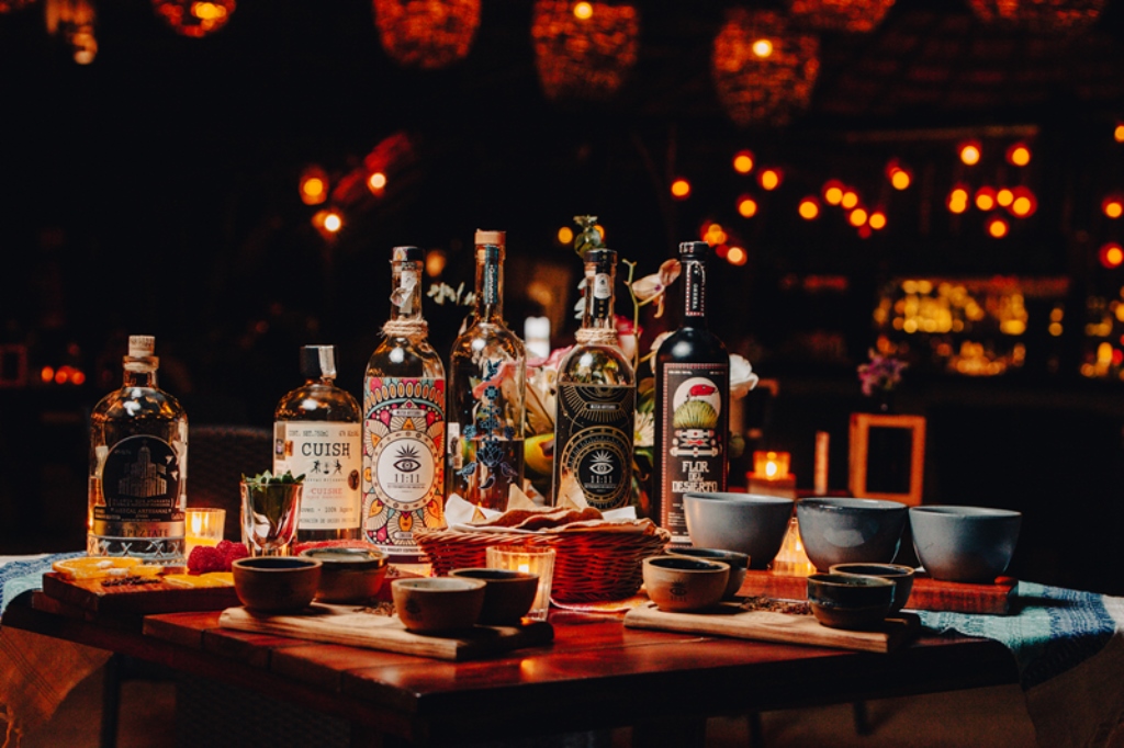 Bar set with bottles and candles for an evening event