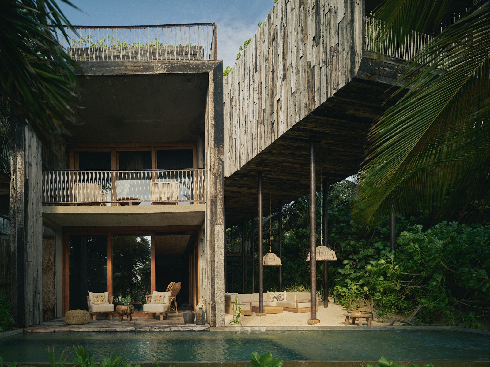 Wooden architecture set among the jungle at Be Tulum