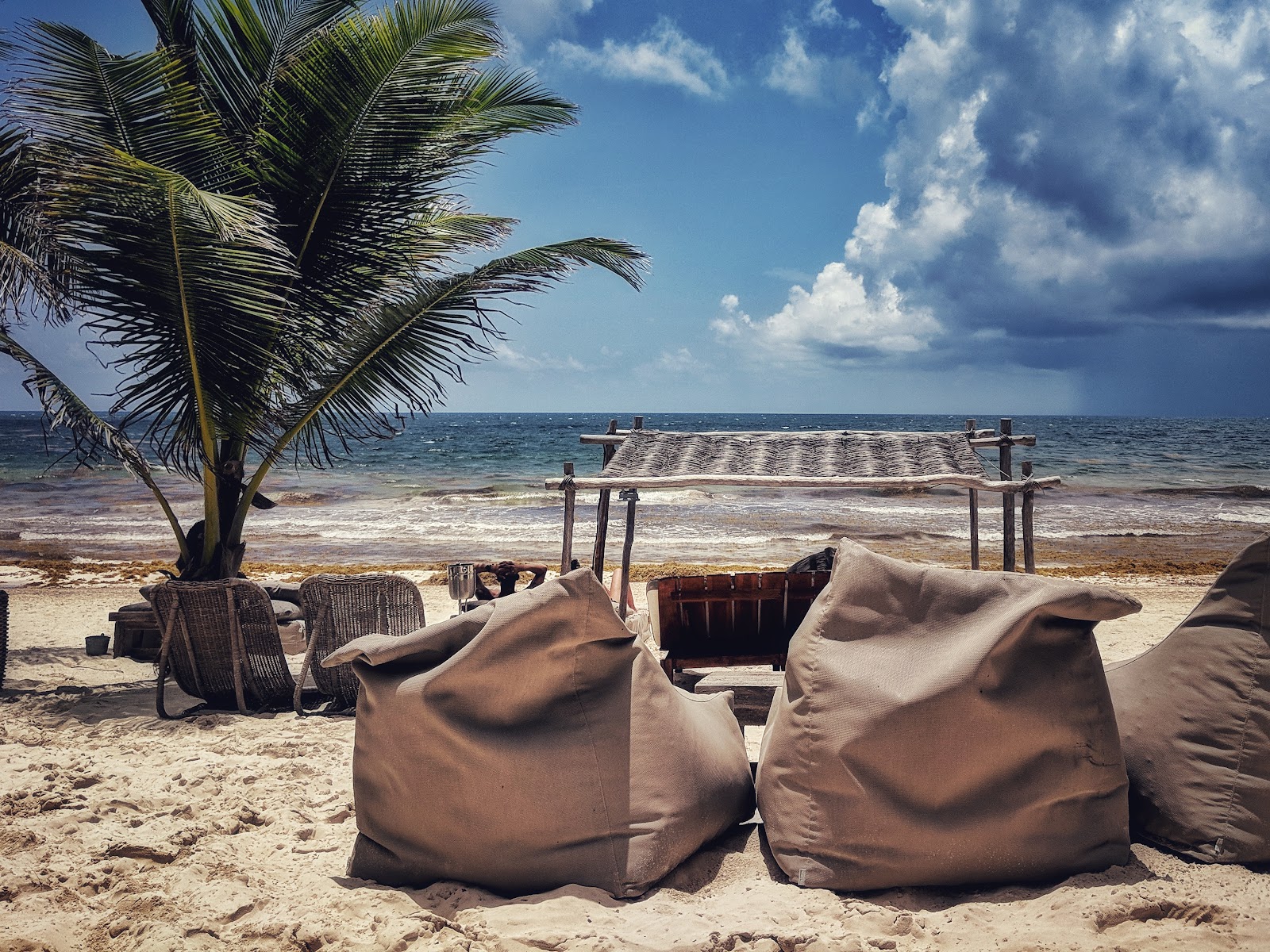 Bean bags and loungers facing the sea