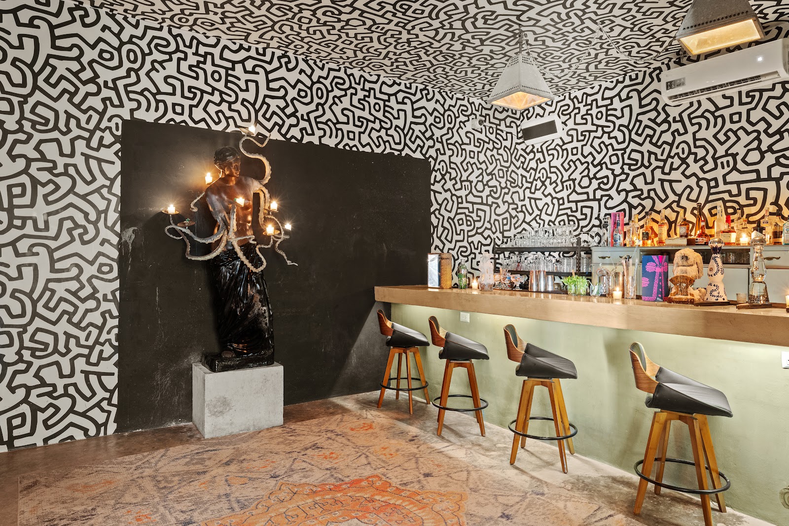 Casa Malca lobby with spotted walls and artwork
