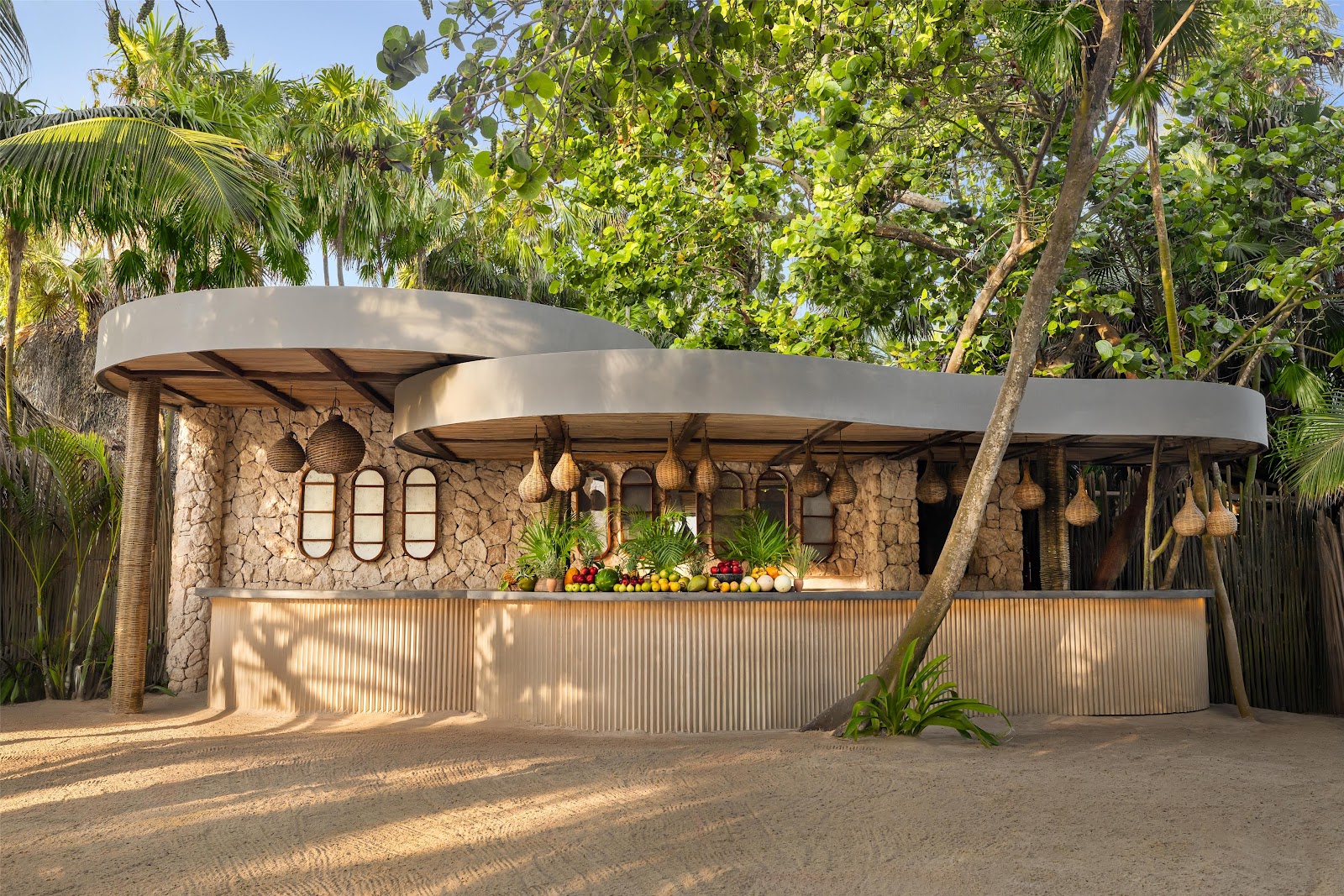 Stone and thatch structure at the Casa Zamna beach club