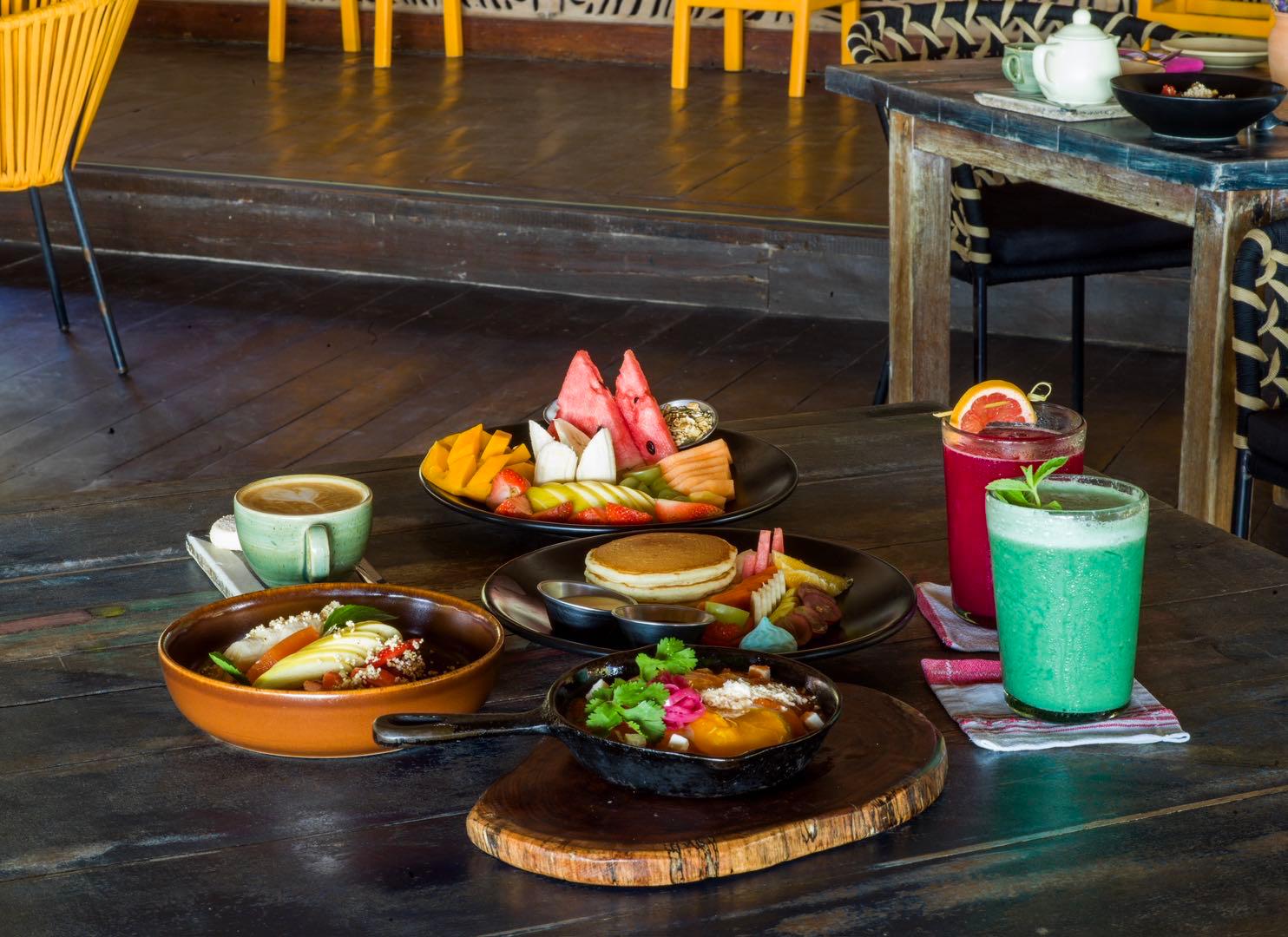 Cocktails and small plates on a table