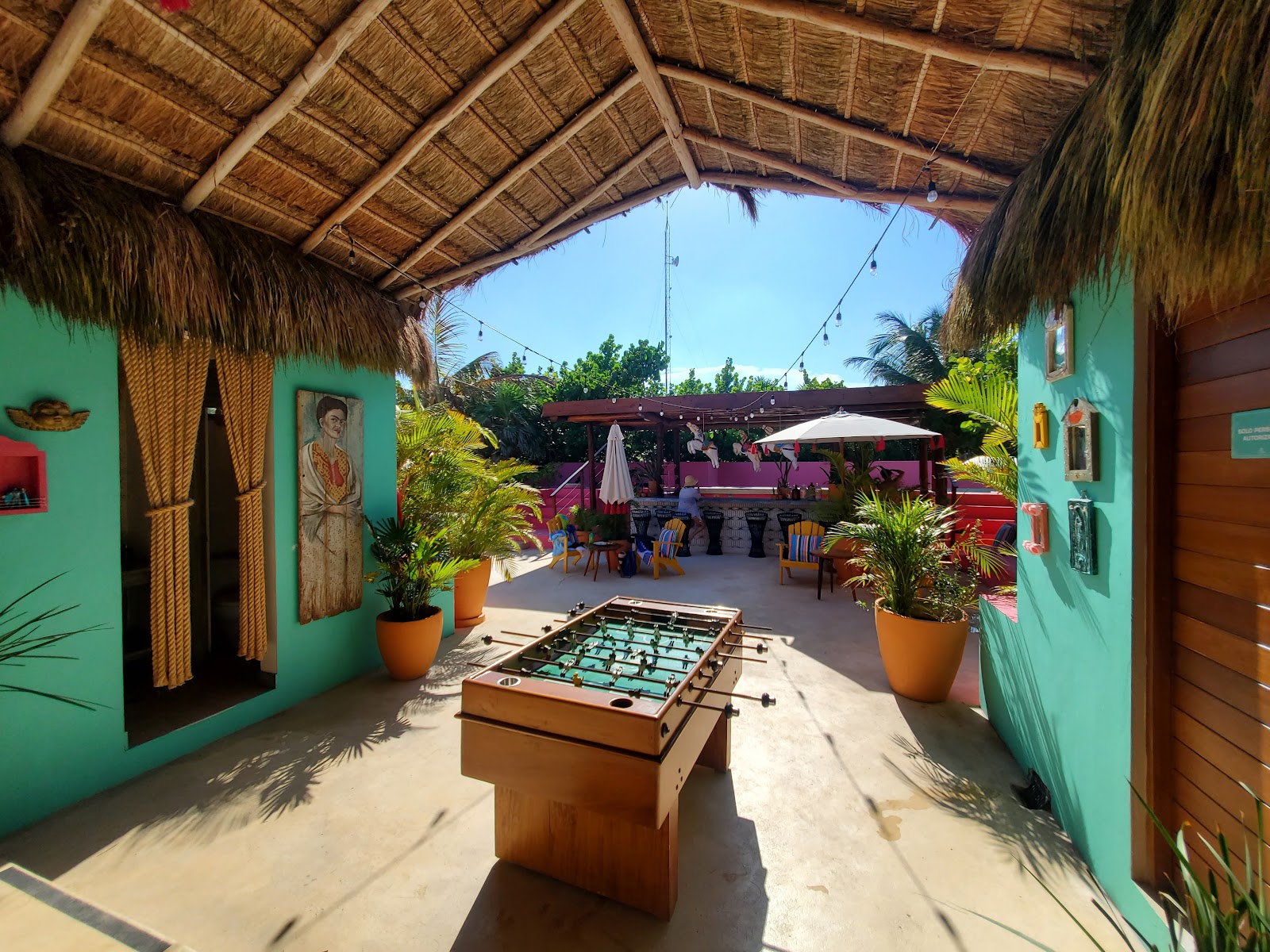 Colorful garden bar with a foosball table