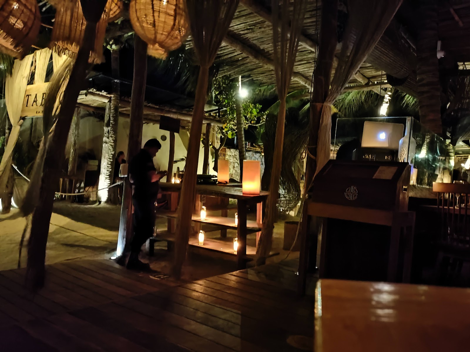 Dimly lit bar and lounge area at night