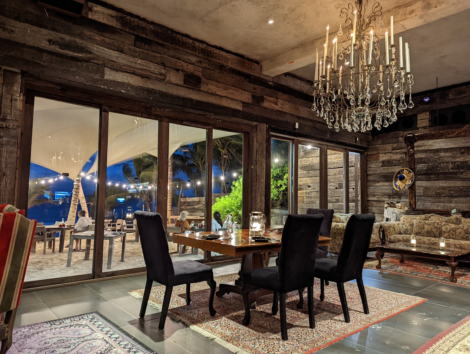 Dining room with a chandelier and garden views