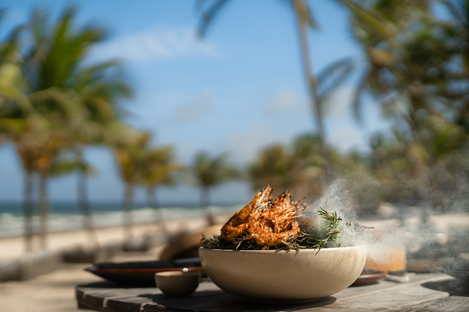 Fire bowl on the sand overlooking the sea