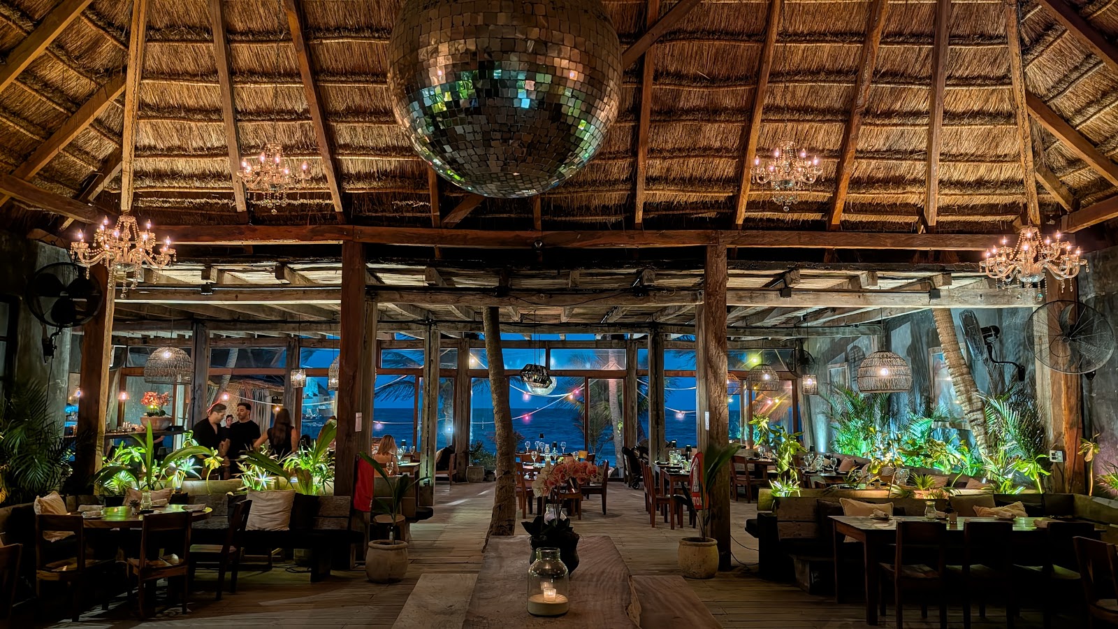 Gitano Beach dining room with a disco ball and tropical decor