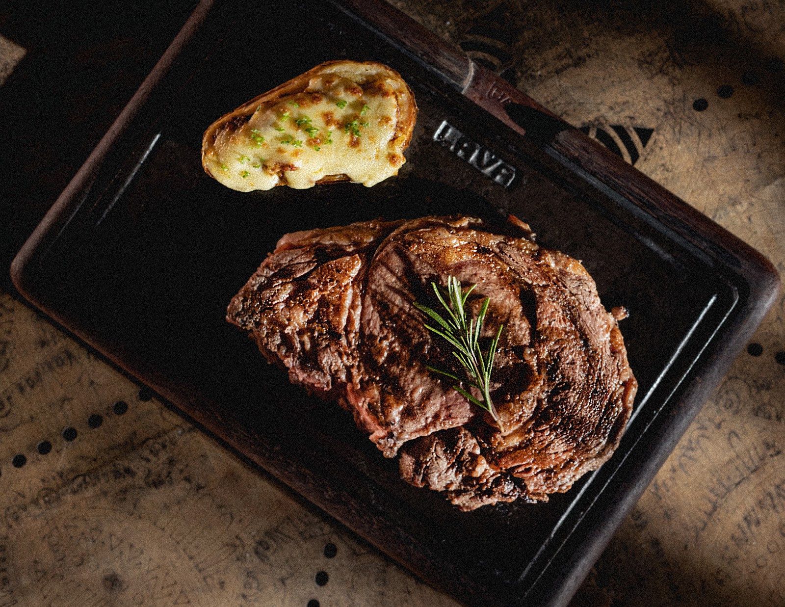 Grilled steak with a baked potato