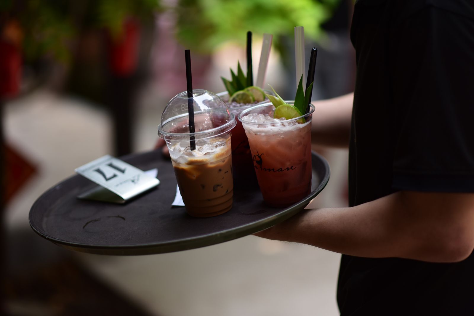 Iced drinks served on a tray outdoors