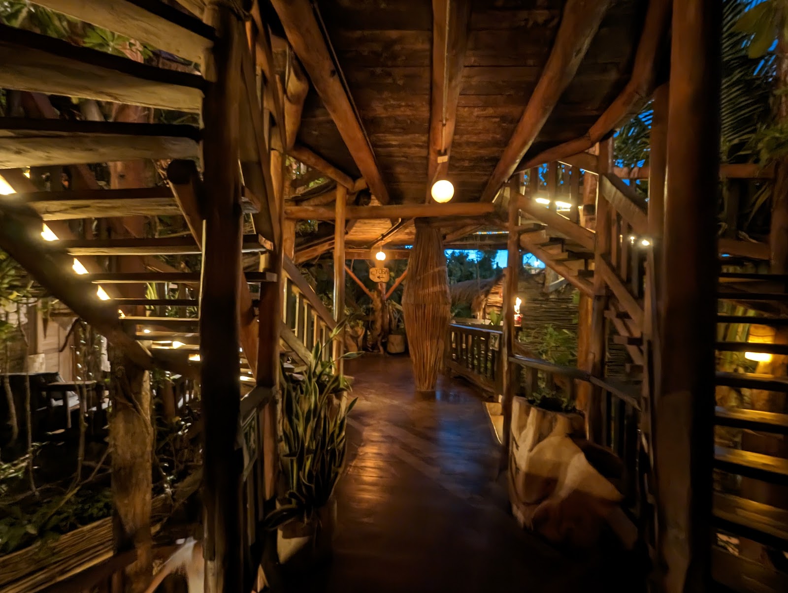 Warmly lit restaurant interior at Kanan Tulum