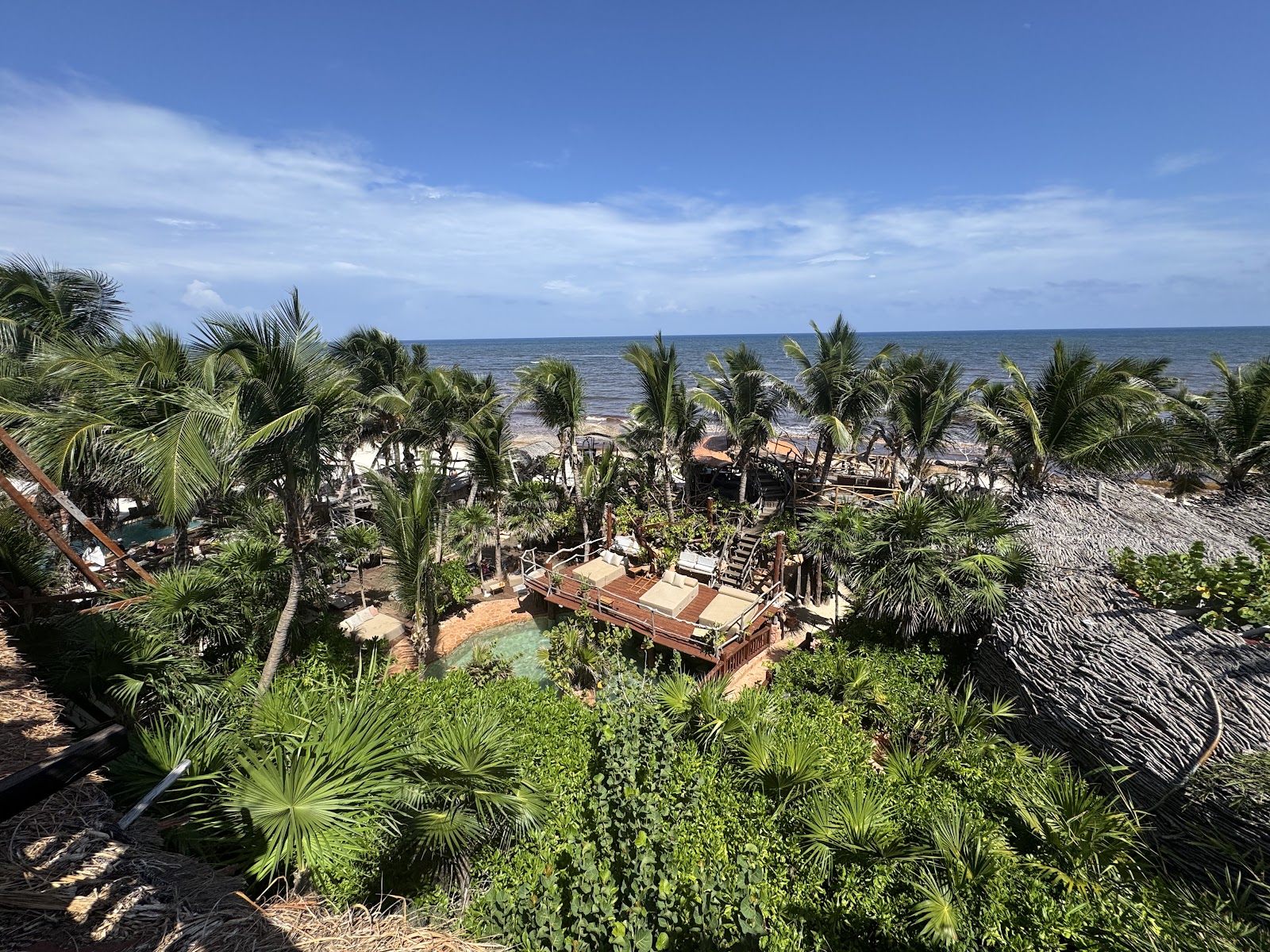 Aerial view over the Kanan Tulum treetops and coast