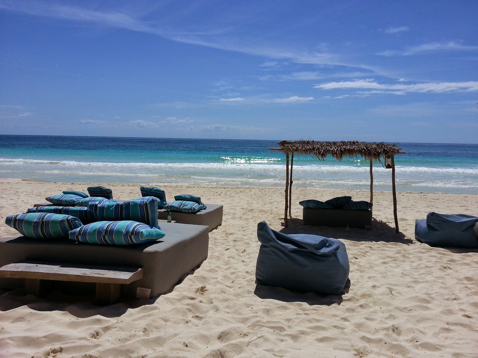 Mare'zia Beach Club lounge beds and bean bags on the sand