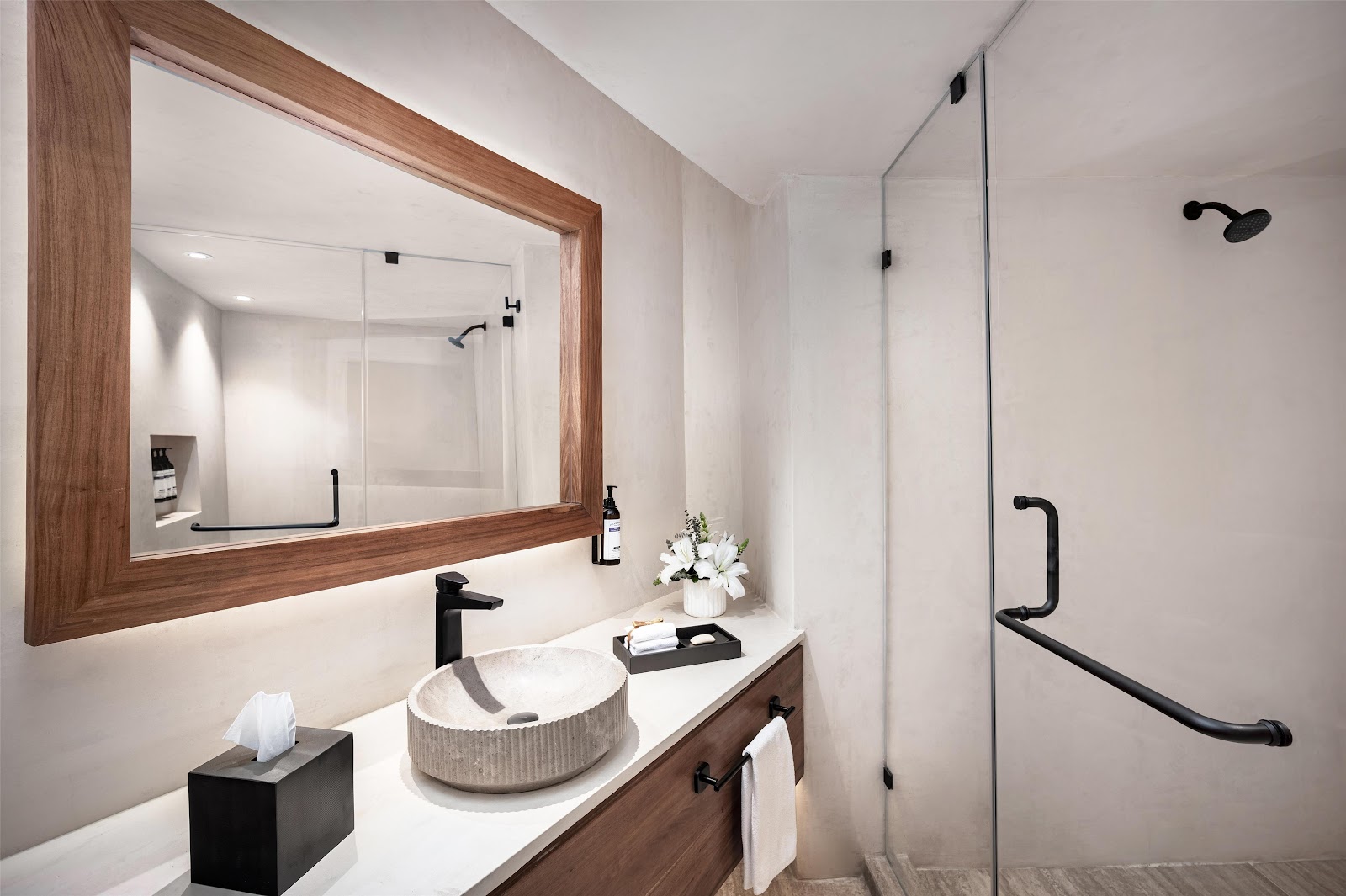 Clean modern bathroom with a stone sink