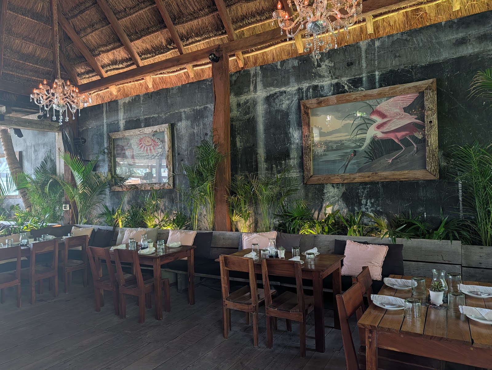 Neatly set dining tables inside the restaurant