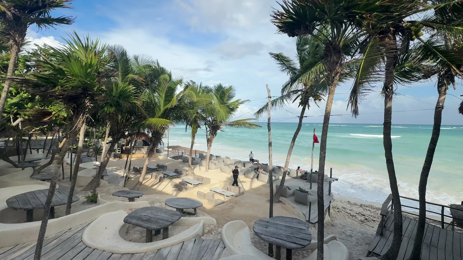 Beachfront lounge area at Papaya Playa Project in Tulum