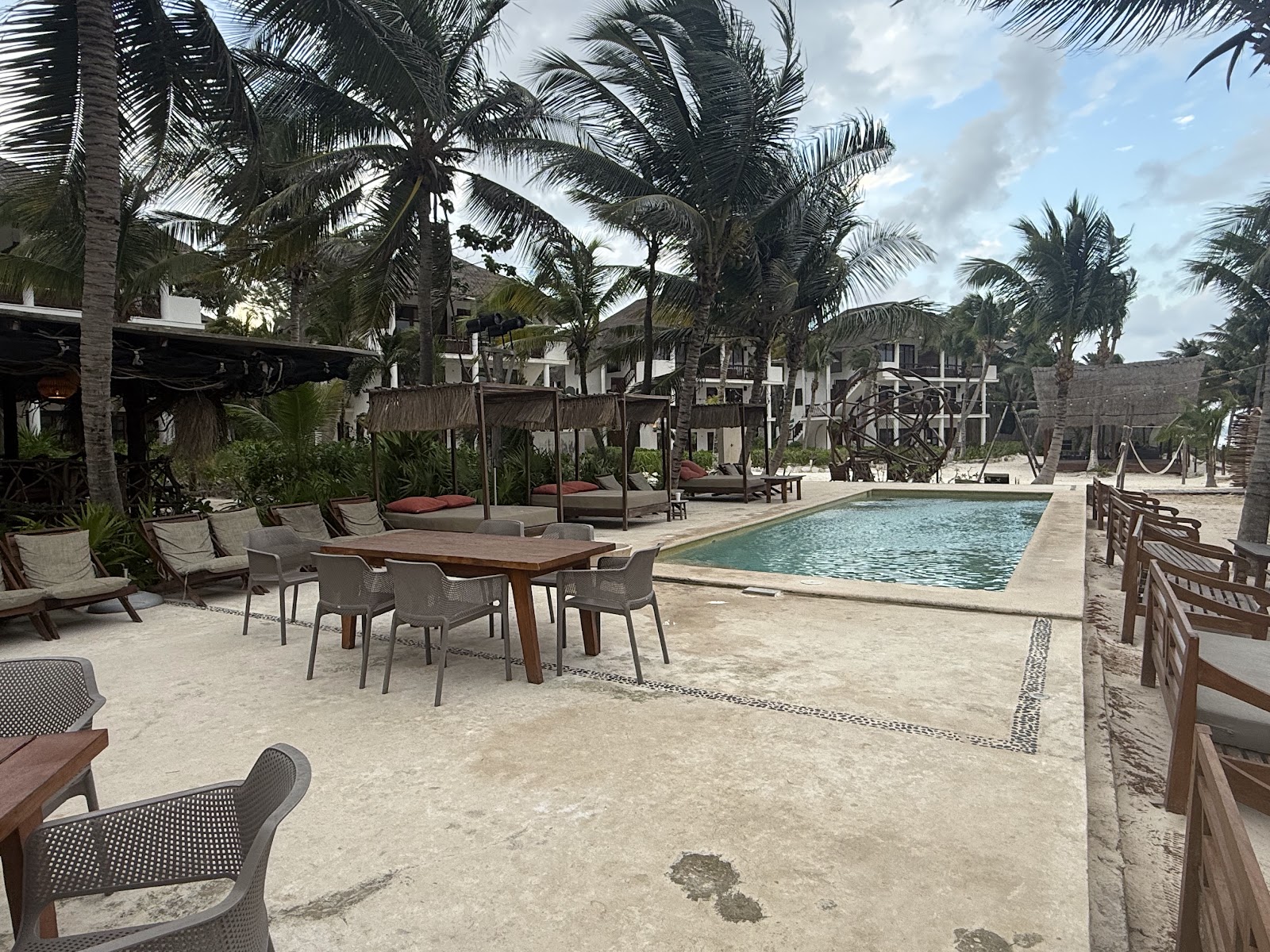 Pool deck with neatly arranged tables
