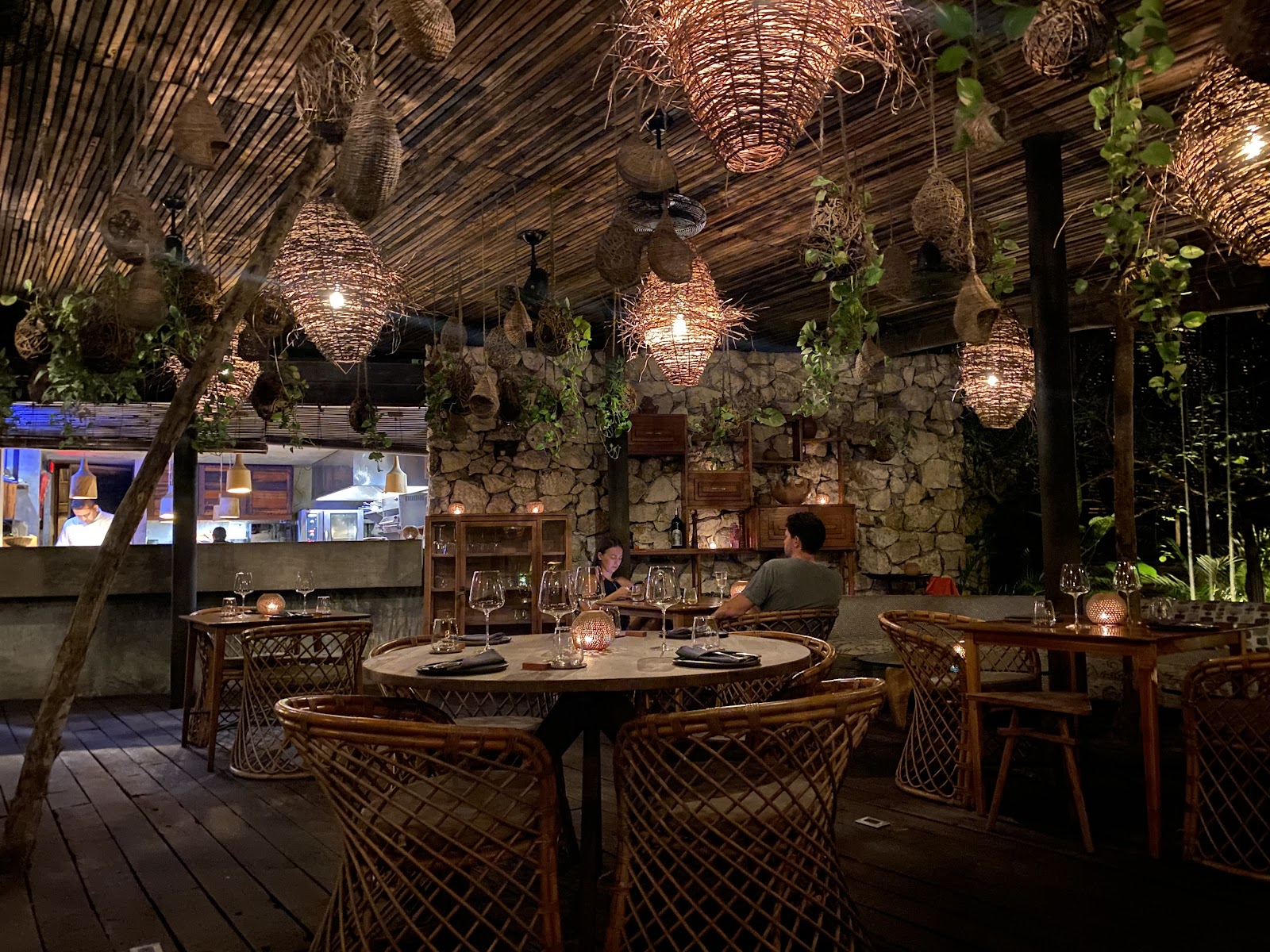 Warmly lit restaurant with hanging lanterns