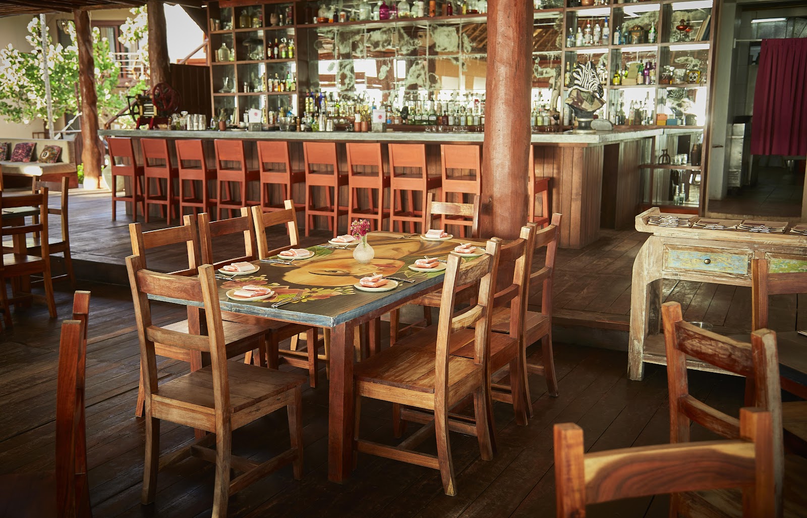 Restaurant tables set with bright tableware