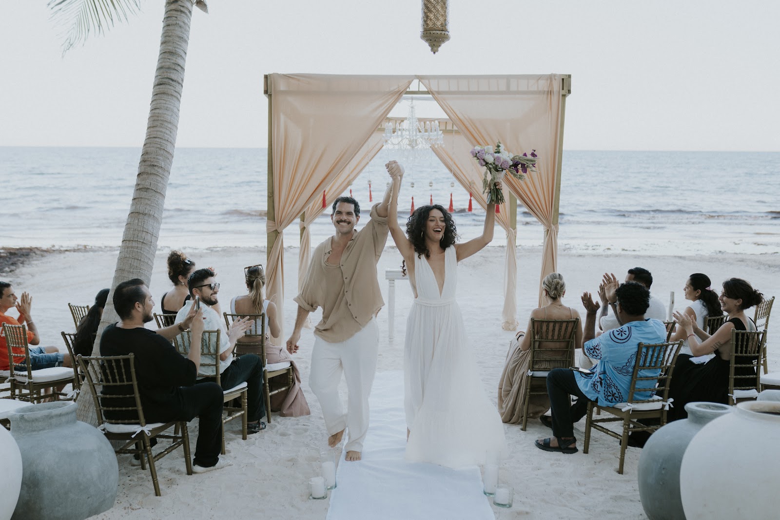 Sana Tulum beach wedding ceremony with guests