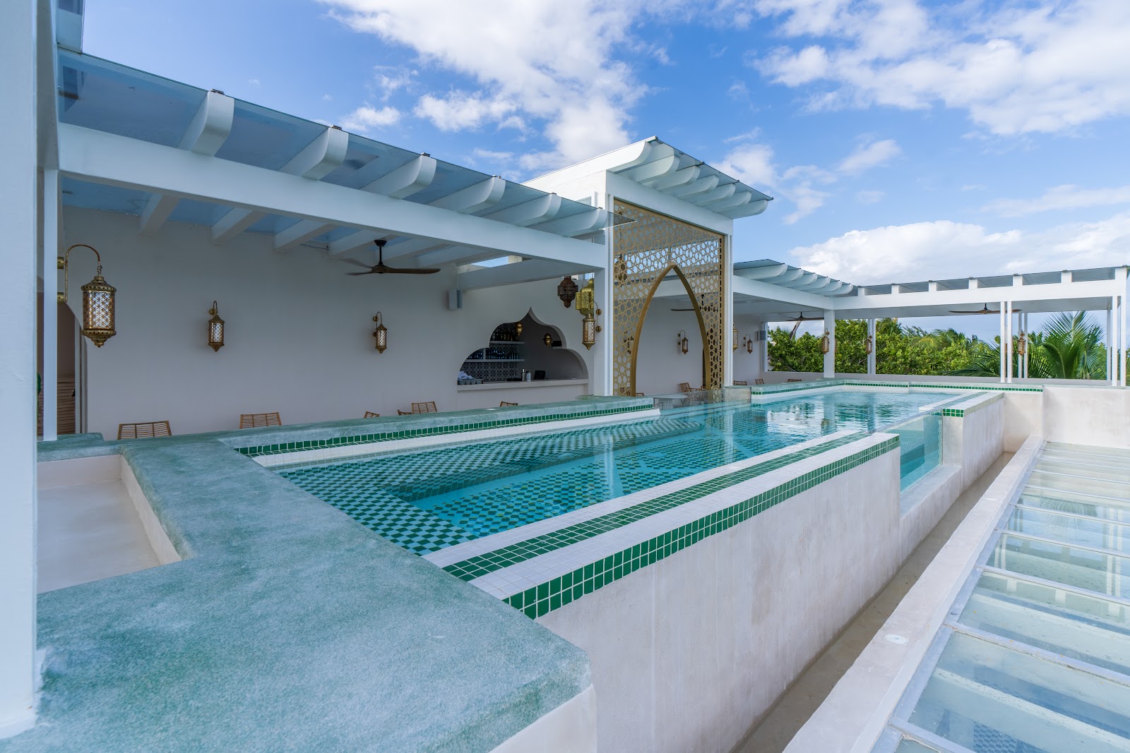 Sana Tulum rooftop pool under a white pergola