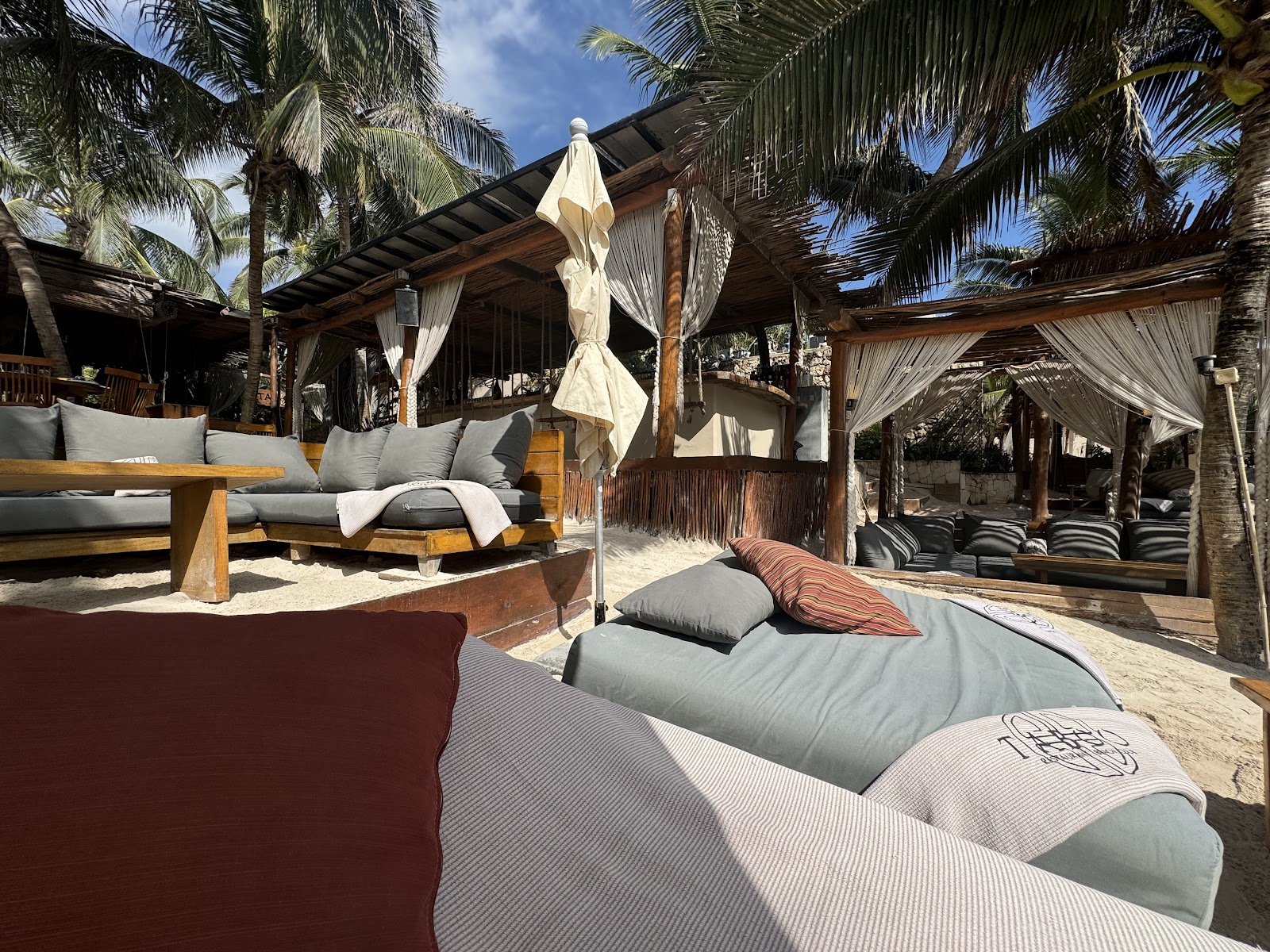 Sunbeds and cabanas on a sunny afternoon