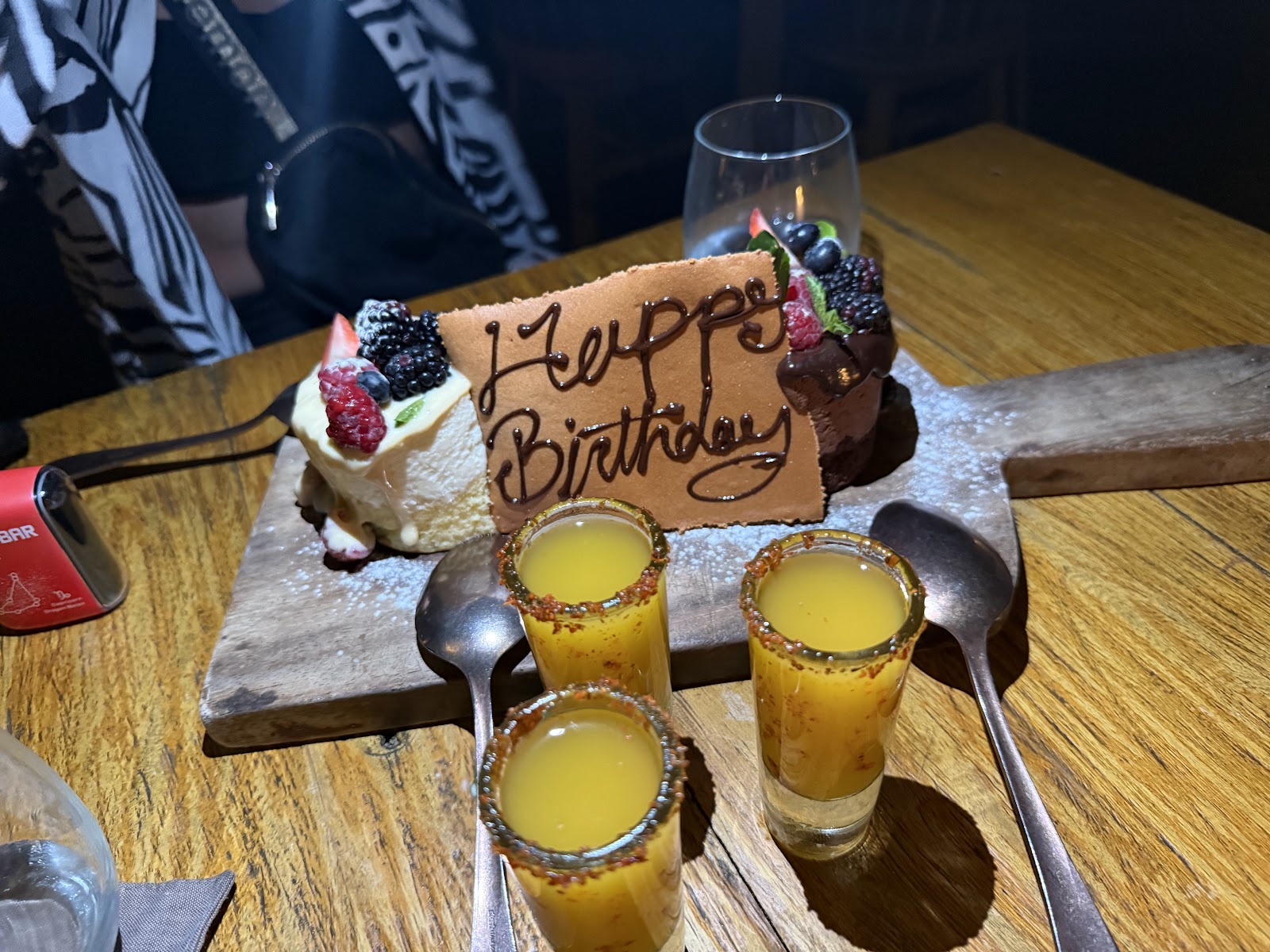 Taboo Tulum birthday dessert with celebratory shots