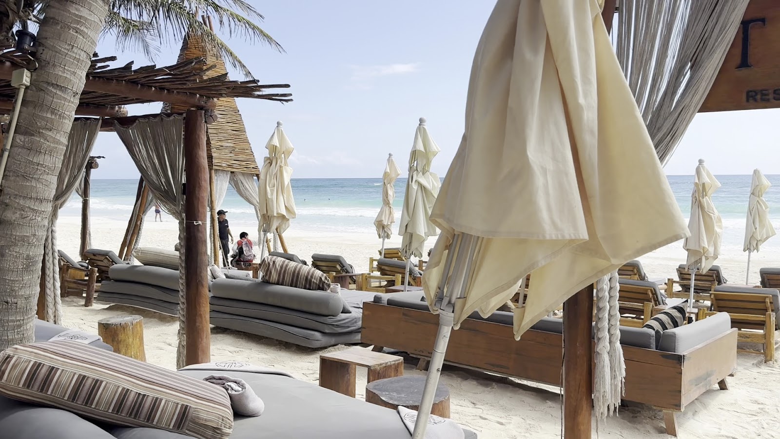 Taboo Tulum daybeds and parasols on the beach