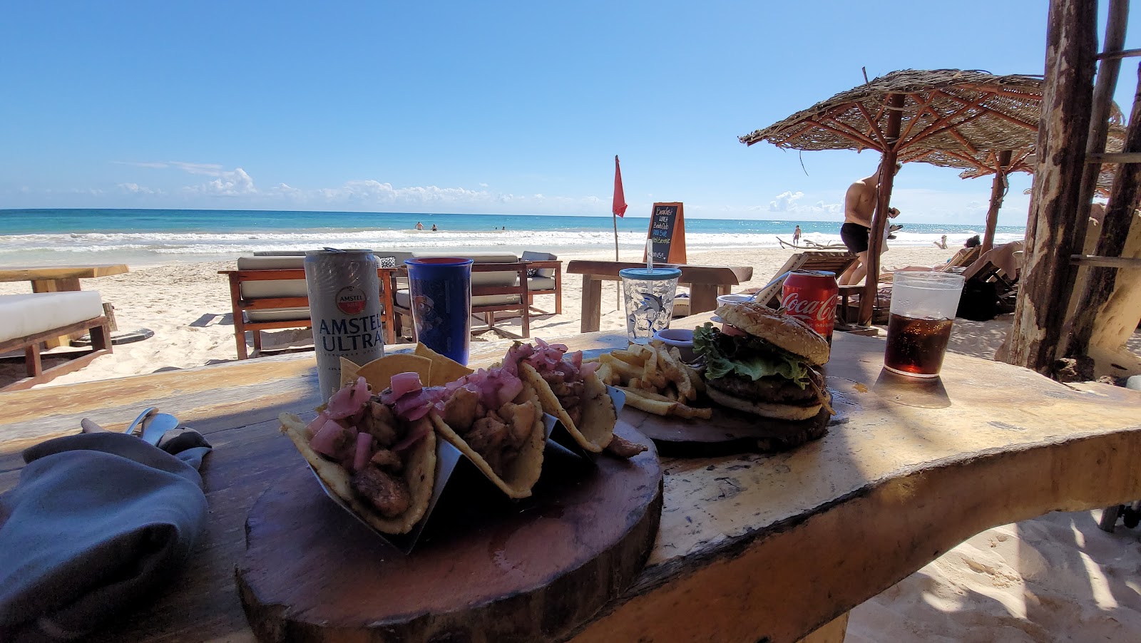 Tacos served on a wooden board at Tulumania