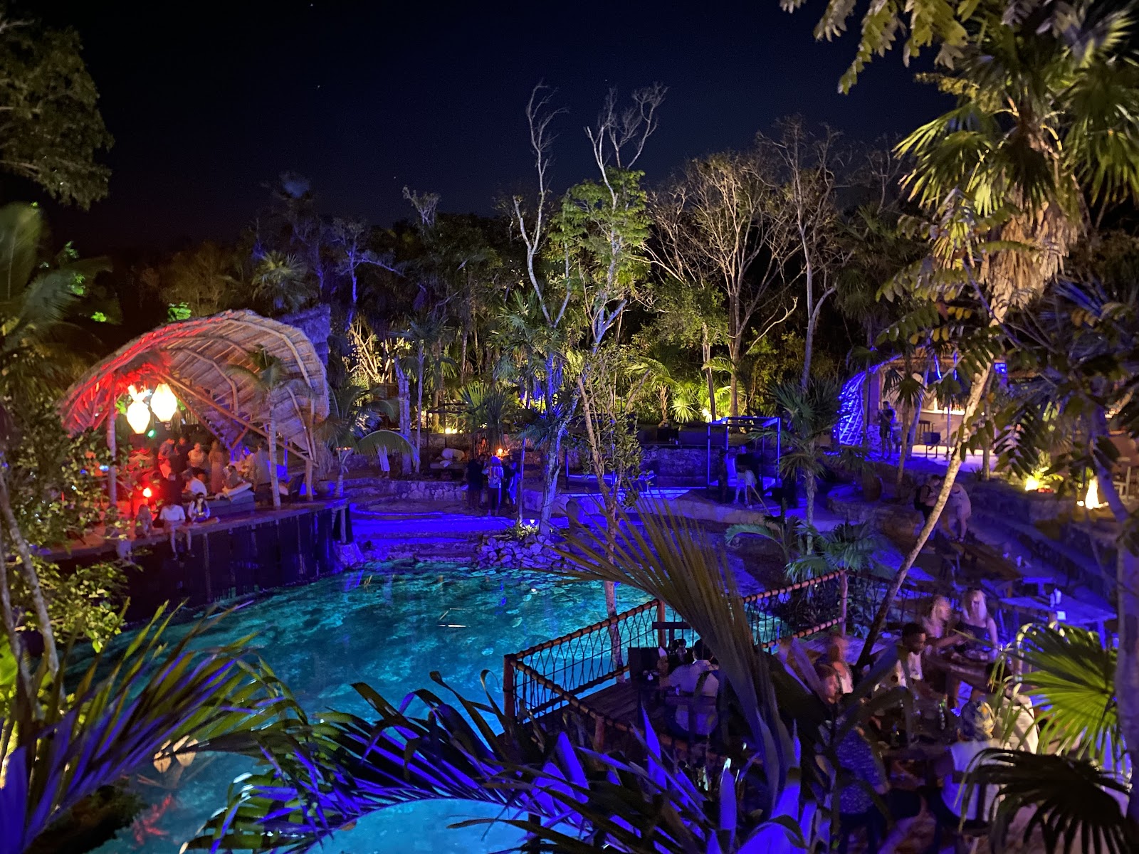 Vesica Tulum lit with colorful lights at night