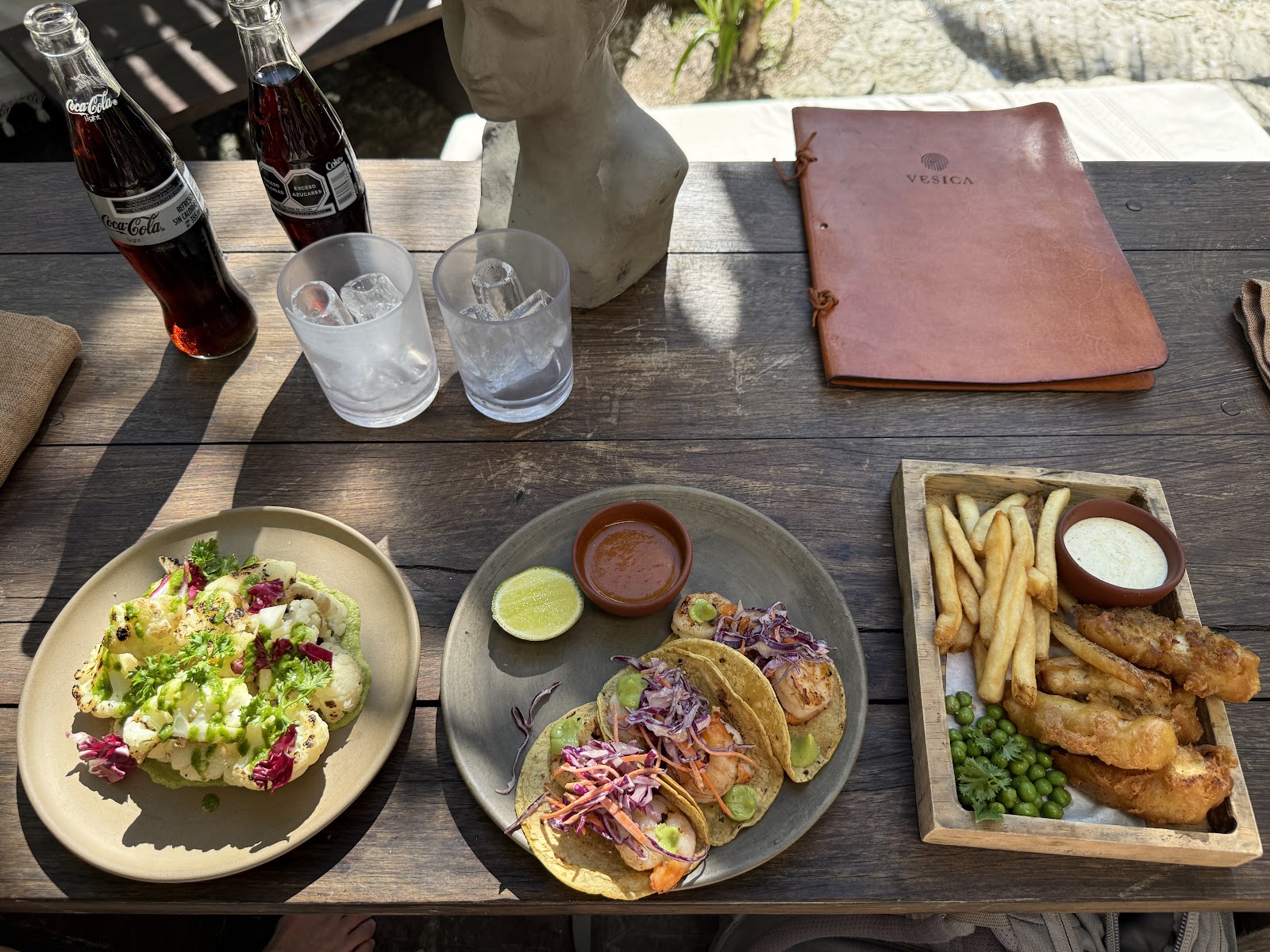 Vesica Tulum lunch spread with salad, tacos and fries