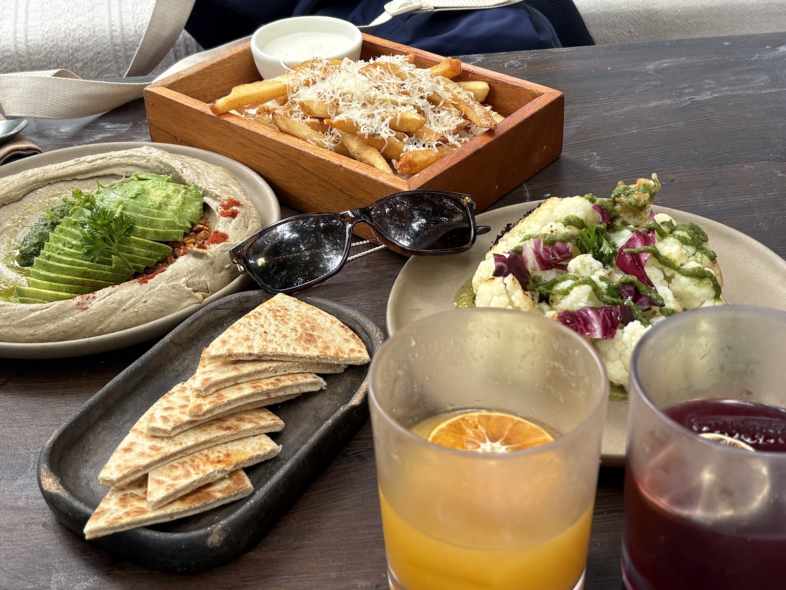 Vesica Tulum plates of salads, flatbread and dips