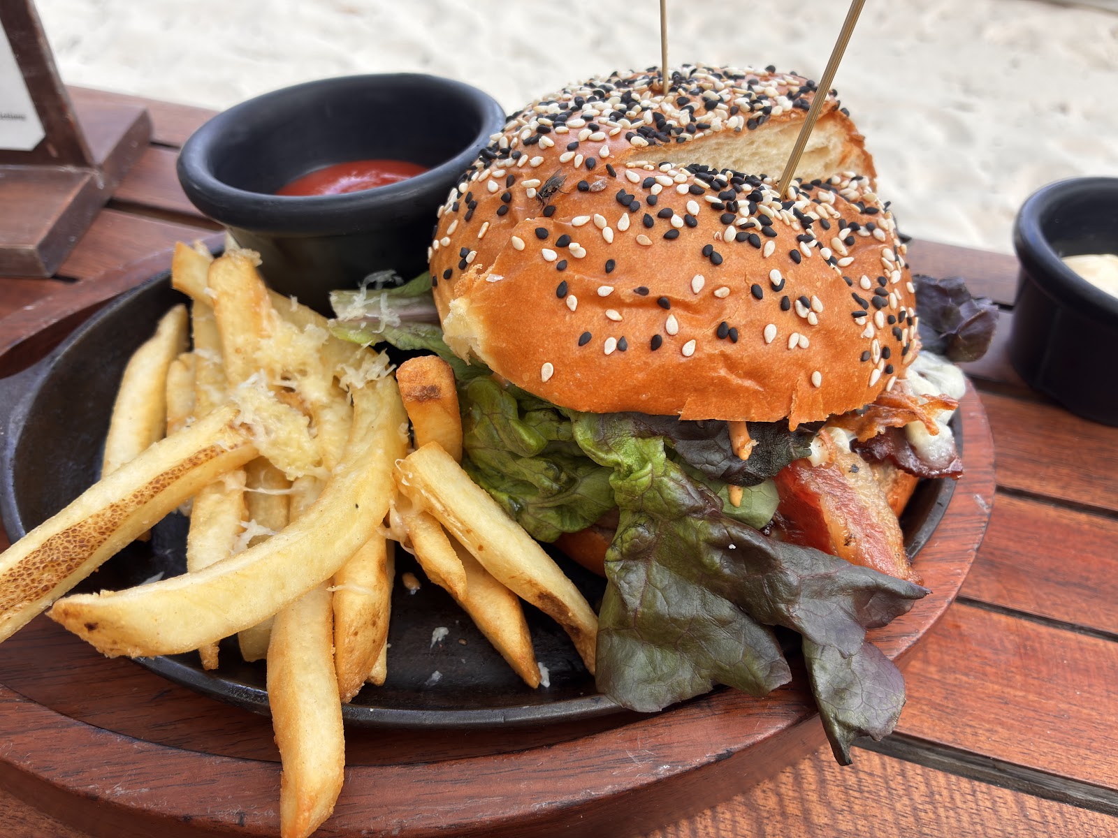 Ziggy burger and fries on a wooden table