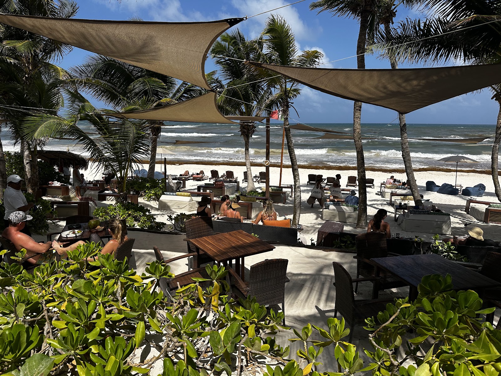 Ziggy Beach Club dining tables with a view of the sea