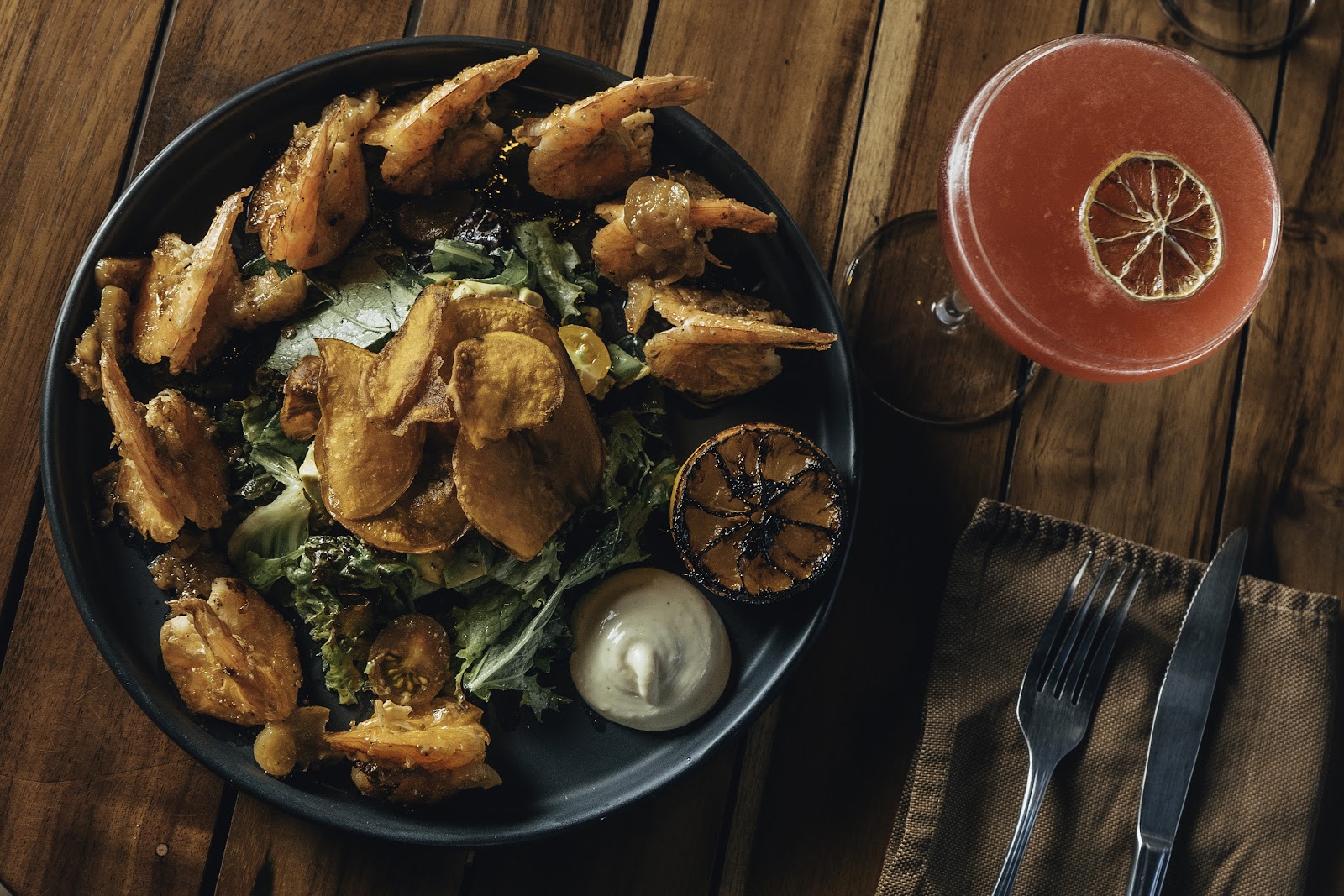 Grilled shrimp platter with a cocktail at Ziggy
